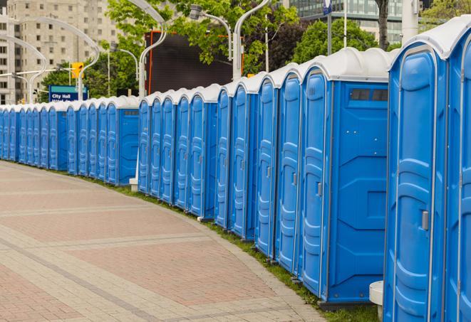 a row of portable restrooms at a fairground, offering visitors a clean and hassle-free experience in princeton